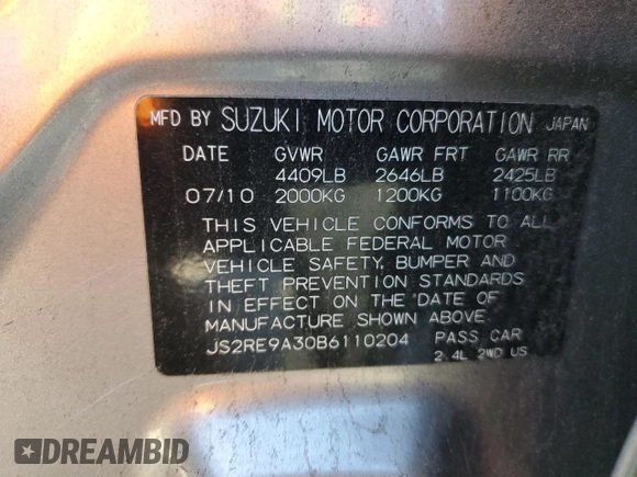 2011 Suzuki Kizashi SE z VIN JS2RE9A30B6110204, wystawiony jako Copart lot #85853384 z przebiegiem 168 962 mil mil oraz Szkoda całkowita • Salvage title. Historia ofert i sprzedaży dostępna na DreamBid. Obrazek 12.