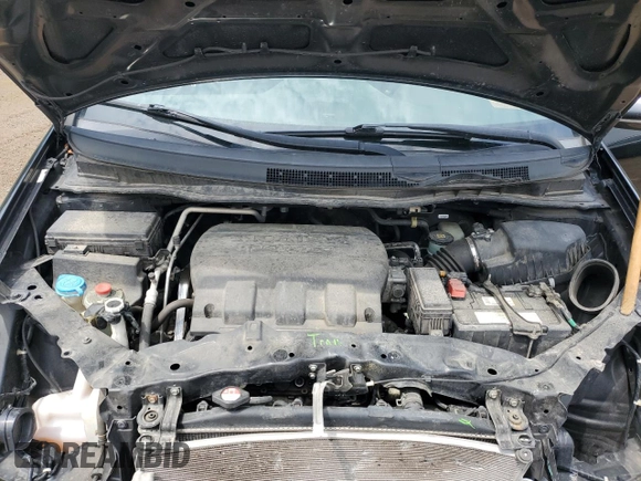 2015 Honda Odyssey Touring Elite with VIN 5FNRL5H9XFB058805, listed as a Copart auction lot 60433785 with 148,320 mi miles and Clean title. Bid and sale history available at DreamBid. Image 12.