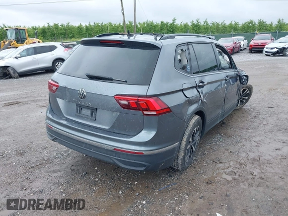 2022 Volkswagen Tiguan S with VIN 3VV1B7AX9NM005125, listed as a IAAI auction lot 42371110 with 94,060 mi miles and . Bid and sale history available at DreamBid. Image 4.
