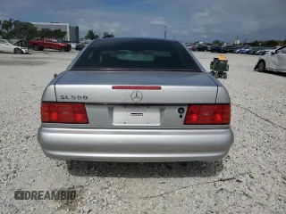 1997 Mercedes-Benz SL-Class with VIN WDBFA67F2VF151123, listed as a Copart auction lot 52703395 with 76,649 mi miles and Non Repairable. Bid and sale history available at carsss.com. Image 6.