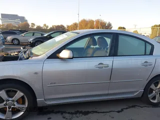 2005 Mazda 3 s with VIN JM1BK323X51247345, listed as a IAAI auction lot 41761337 with 156,060 mi miles. Bid and sale history available at carsss.com. Image 14.
