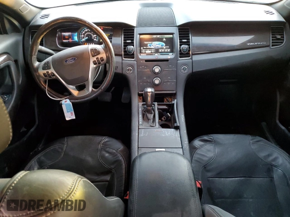 2015 Ford Taurus Limited with VIN 1FAHP2F88FG144487, listed as a Copart auction lot 42692205 with 147,597 mi miles and Salvage Title. Bid and sale history available at DreamBid. Image 8.