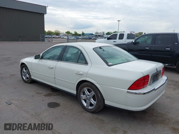 2002 Lincoln LS w/Base Pkg with VIN 1LNHM87A12Y643476, listed as a IAAI auction lot 42131765 with 205,900 mi miles. Bid and sale history available at carsss.com. Image 3.
