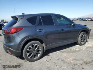 2016 Mazda CX-5 Grand Touring with VIN JM3KE4DY0G0674717, listed as a Copart auction lot 52053165 with 36,341 mi miles and Salvage Title. Bid and sale history available at carsss.com. Image 3.
