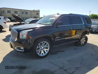 2015 GMC Yukon Denali z VIN 1GKS1CKJ8FR748131, wystawiony jako Copart lot #55213205 z przebiegiem 101 758 mil mil oraz Szkoda całkowita • Salvage title. Historia ofert i sprzedaży dostępna na DreamBid. Obrazek 1.