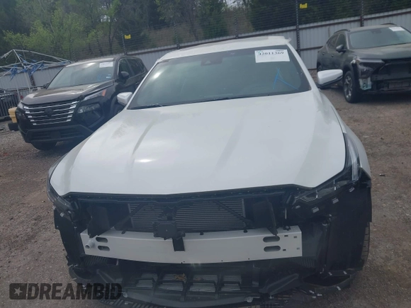 2024 Cadillac CT5 Premium Luxury z VIN 1G6DT5RW3R0129279, wystawiony jako IAAI lot #42011369 z przebiegiem 5 477 mil mil oraz . Historia ofert i sprzedaży dostępna na DreamBid. Obrazek 13.