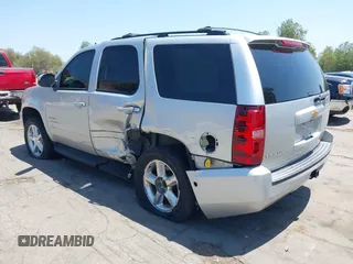 2012 Chevrolet Tahoe LT z VIN 1GNSCBE06CR255554, wystawiony jako IAAI lot #42544690 z przebiegiem 136 070 mil mil oraz . Historia ofert i sprzedaży dostępna na DreamBid. Obrazek 3.