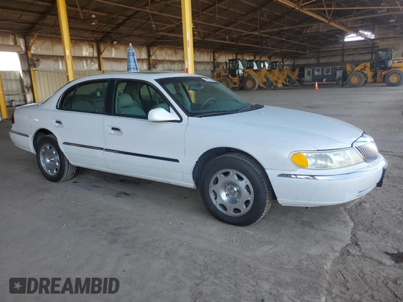 2001 Lincoln Continental with VIN 1LNHM97V31Y622782, listed as a Copart auction lot 74023344 with 116,672 mi miles and Salvage Title. Bid and sale history available at carsss.com. Image 4.