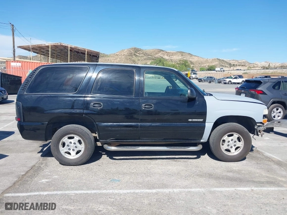 2001 Chevrolet Tahoe LT with VIN 1GNEC13T31R122882, listed as a IAAI auction lot 41999271 with 211,687 mi miles. Bid and sale history available at carsss.com. Image 14.