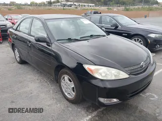 2002 Toyota Camry XLE z VIN 4T1BF30K02U006267, wystawiony jako IAAI lot #42073083 z przebiegiem 171 443 mil mil oraz . Historia ofert i sprzedaży dostępna na DreamBid. Obrazek 1.