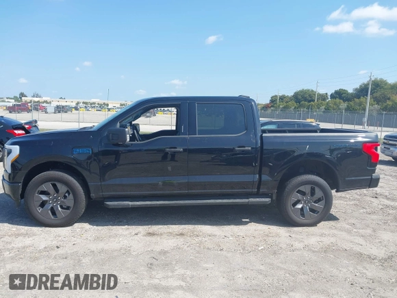 2024 Ford F-150 Lightning XLT with VIN 1FTVW3LK8RWG20320, listed as a IAAI auction lot 41960103 with Not provided miles and . Bid and sale history available at DreamBid. Image 13.