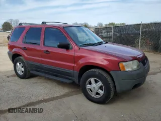 2004 Ford Escape XLS with VIN 1FMYU02144DA21005, listed as a Copart auction lot 45536325 with 189,661 mi miles and Salvage Title. Bid and sale history available at DreamBid. Image 4.