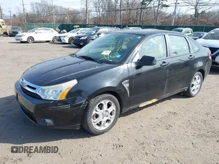 2008 Ford Focus SE with VIN 1FAHP35N68W278579, listed as a IAAI auction lot 41801538 with 999,999 mi miles. Bid and sale history available at carsss.com. Image 2.
