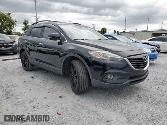 2015 Mazda CX-9 Grand Touring z VIN JM3TB2DA8F0457807, wystawiony jako Copart lot #61803555 z przebiegiem 110 104 mil mil oraz Czysty tytuł • Clean title. Historia ofert i sprzedaży dostępna na DreamBid. Obrazek 4.