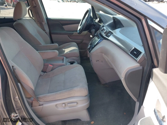 2016 Honda Odyssey SE with VIN 5FNRL5H3XGB043251, listed as a IAAI auction lot 42050805 with 156,537 mi miles. Bid and sale history available at carsss.com. Image 5.