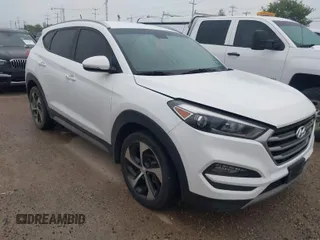 2017 Hyundai Tucson Sport with VIN KM8J3CA24HU563663, listed as a IAAI auction lot 41910311 with 99,361 mi miles and . Bid and sale history available at DreamBid. Image 1.