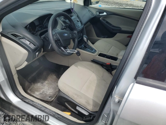 2018 Ford Focus SE z VIN 1FADP3F27JL250591, wystawiony jako Copart lot #54989245 z przebiegiem 85 838 mil mil oraz Szkoda całkowita • Salvage title. Historia ofert i sprzedaży dostępna na DreamBid. Obrazek 7.