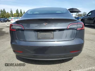2019 Tesla Model 3 Mid Range with VIN 5YJ3E1EA0KF445185, listed as a Copart auction lot 48630675 with 76,351 mi miles and Salvage Title. Bid and sale history available at carsss.com. Image 6.