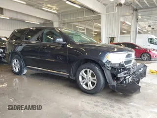 2013 Dodge Durango SXT with VIN 1C4RDJAG9DC695189, listed as a IAAI auction lot 41365166 with 199,854 mi miles. Bid and sale history available at carsss.com. Image 1.