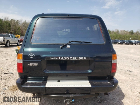 1995 Toyota Land Cruiser z VIN JT3DJ81W9S0112464, wystawiony jako Copart lot #49925395 z przebiegiem 215 698 mil mil oraz Czysty tytuł • Clean title. Historia ofert i sprzedaży dostępna na DreamBid. Obrazek 6.