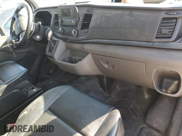 2021 Ford Transit Cargo with VIN 1FTBR1C84MKA29405, listed as a Copart auction lot 77642004 with 144,624 mi miles and Salvage Title. Bid and sale history available at DreamBid. Image 8.