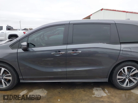 2021 Honda Odyssey Touring with VIN 5FNRL6H86MB021504, listed as a IAAI auction lot 41550040 with 55,068 mi miles. Bid and sale history available at carsss.com. Image 15.