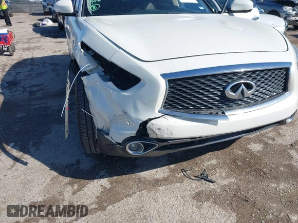 2017 Infiniti QX70 z VIN JN8CS1MU0HM143050, wystawiony jako IAAI lot #41712100 z przebiegiem 123 907 mil mil oraz . Historia ofert i sprzedaży dostępna na DreamBid. Obrazek 6.