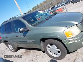 2003 GMC Envoy SLT with VIN 1GKDS13S432373988, listed as a IAAI auction lot 41840744 with 221,306 mi miles. Bid and sale history available at carsss.com. Image 13.