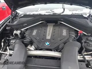 2014 BMW X6 50i z VIN 5UXFG8C51EL592380, wystawiony jako IAAI lot #41566410 z przebiegiem 110 142 mil mil oraz . Historia ofert i sprzedaży dostępna na DreamBid. Obrazek 10.