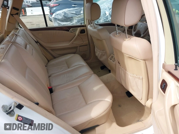 2001 Mercedes-Benz E-Class with VIN WDBJH65J31B364290, listed as a IAAI auction lot 41545677 with 162,040 mi miles. Bid and sale history available at carsss.com. Image 8.
