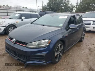 2018 Volkswagen Golf GTI S with VIN 3VW447AUXJM275709, listed as a IAAI auction lot 41282474 with 136,496 mi miles. Bid and sale history available at carsss.com. Image 2.
