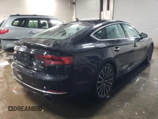 2019 Audi A5 Sportback Premium Plus with VIN WAUBNCF59KA003973, listed as a Copart auction lot 82727443 with 83,187 mi miles. Bid and sale history available at carsss.com. Image 3.