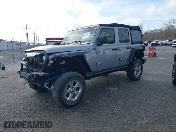 2020 Jeep Wrangler Unlimited Sport S with VIN 1C4HJXDG4LW221778, listed as a IAAI auction lot 41441662 with 76,026 mi miles and . Bid and sale history available at DreamBid. Image 14.
