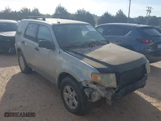 2009 Ford Escape XLT with VIN 1FMCU93G29KC41151, listed as a IAAI auction lot 42078509 with 238,350 mi miles. Bid and sale history available at carsss.com. Image 1.