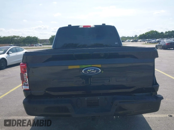 2023 Ford F-150 XL with VIN 1FTEW1C56PFC28013, listed as a IAAI auction lot 42242994 with Not Provided miles and . Bid and sale history available at DreamBid. Image 16.