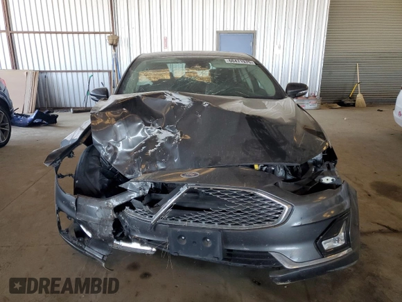 2020 Ford Fusion Titanium with VIN 3FA6P0K92LR115615, listed as a Copart auction lot 60471975 with 73,069 mi miles and Salvage title. Bid and sale history available at DreamBid. Image 5.