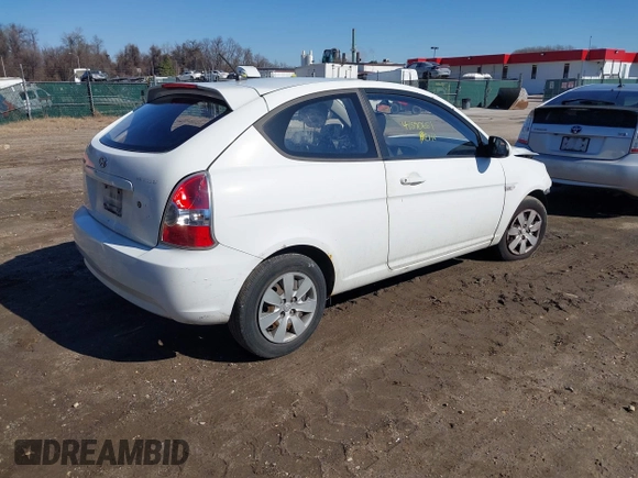 2008 Hyundai Accent GS with VIN KMHCM36C68U055850, listed as a IAAI auction lot 41590651 with 198,827 mi miles. Bid and sale history available at carsss.com. Image 4.