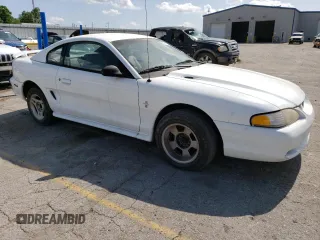 1996 Ford Mustang with VIN 1FALP4041TF206244, listed as a Copart auction lot 56311934 with 123,572 mi miles and Salvage Title. Bid and sale history available at carsss.com. Image 4.
