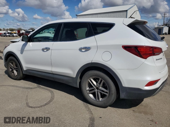 2018 Hyundai Santa Fe 2.4L z VIN 5NMZTDLB1JH076587, wystawiony jako Copart lot #51484585 z przebiegiem 106 026 mil mil oraz Szkoda całkowita • Salvage title. Historia ofert i sprzedaży dostępna na DreamBid. Obrazek 2.