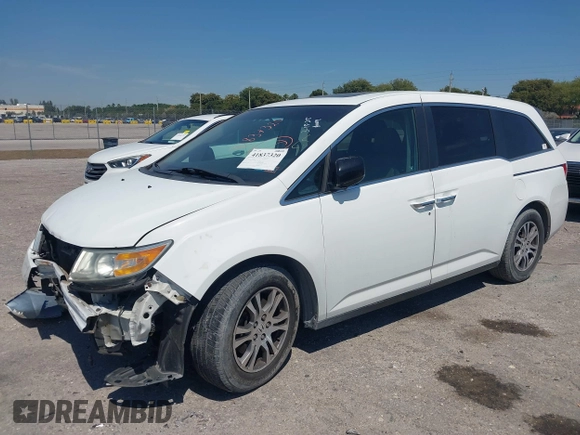 2012 Honda Odyssey EX-L with VIN 5FNRL5H61CB019215, listed as a IAAI auction lot 41837320 with 248,498 mi miles and . Bid and sale history available at DreamBid. Image 18.