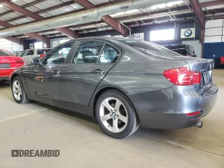 2014 BMW 3 Series 320i xDrive with VIN WBA3C3C53EF985375, listed as a Copart auction lot 62833435 with 75,726 mi miles and Salvage title. Bid and sale history available at DreamBid. Image 2.
