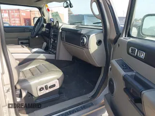 2003 Hummer H2 with VIN 5GRGN23U23H148326, listed as a IAAI auction lot 42068326 with 149,396 mi miles. Bid and sale history available at carsss.com. Image 5.
