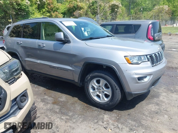 2017 Jeep Grand Cherokee Altitude with VIN 1C4RJEAG6HC647333, listed as a IAAI auction lot 42071820 with 129,740 mi miles and . Bid and sale history available at DreamBid. Image 1.