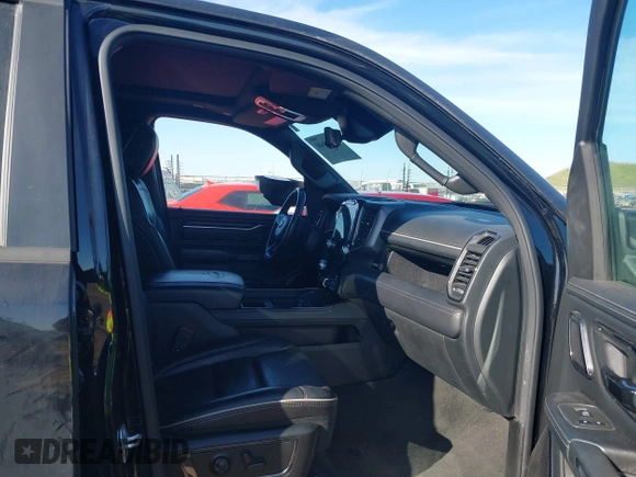 2023 Ram 1500 Limited with VIN 1C6SRFHT5PN542859, listed as a IAAI auction lot 41669646 with 80,045 mi miles and . Bid and sale history available at DreamBid. Image 5.