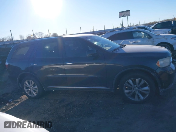 2013 Dodge Durango Crew z VIN 1C4SDJDT4DC674504, wystawiony jako IAAI lot #41039934 z przebiegiem 155 088 mil mil oraz . Historia ofert i sprzedaży dostępna na DreamBid. Obrazek 13.