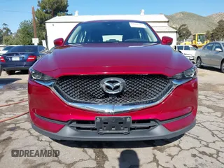2019 Mazda CX-5 Sport with VIN JM3KFABM0K1633065, listed as a IAAI auction lot 41968786 with 90,407 mi miles and . Bid and sale history available at DreamBid. Image 12.