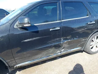 2013 Dodge Durango Crew z VIN 1C4RDJDG9DC677142, wystawiony jako IAAI lot #41834251 z przebiegiem 138 307 mil mil oraz . Historia ofert i sprzedaży dostępna na DreamBid. Obrazek 6.