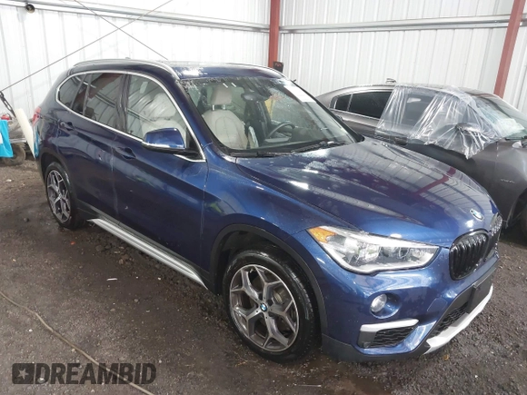 2019 BMW X1 xDrive28i z VIN WBXHT3C56K3H34720, wystawiony jako IAAI lot #42113497 z przebiegiem 64 906 mil mil oraz . Historia ofert i sprzedaży dostępna na DreamBid. Obrazek 1.