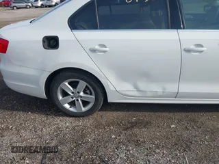 2013 Volkswagen Jetta TDI w/Premium with VIN 3VWLL7AJ6DM422102, listed as a IAAI auction lot 41956935 with 143,385 mi miles and . Bid and sale history available at DreamBid. Image 6.