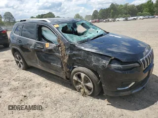 2019 Jeep Cherokee Limited with VIN 1C4PJLDB0KD357151, listed as a Copart auction lot 56416505 with 110,932 mi miles and Salvage title. Bid and sale history available at DreamBid. Image 4.